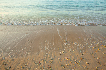 Wave of the sea on the sand beach