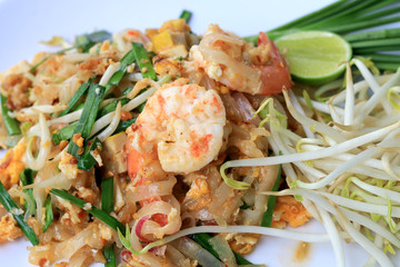 Thai food Pad Thai ,Stir fry noodles with shrimp in white plate. The one of Thailand's national main dish. the popular food in Thailand. Thai Fried Noodles.