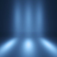 Blue spotlight background. Empty gray studio.