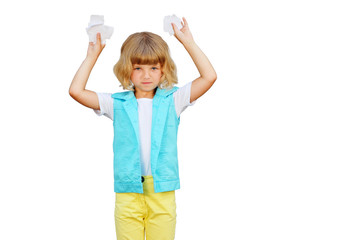 Little girl with sheets of paper