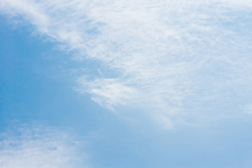 Naklejka na ściany i meble Blue sky with clouds background lines intersect.