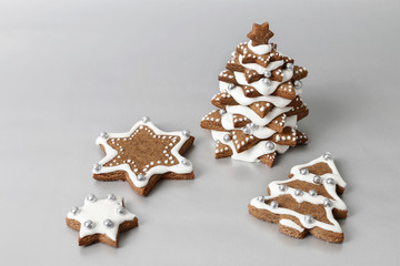 Gingerbread Christmas cookies on silver background.