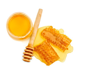 Fototapeta na wymiar Bank with fresh honey and honeycomb on white background.