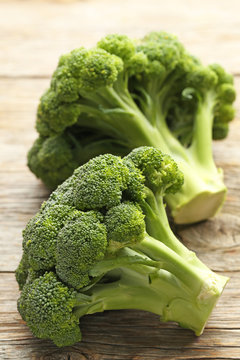 Broccoli on grey wooden table