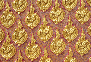 Traditional golden pattern Thai on background in Thai temple