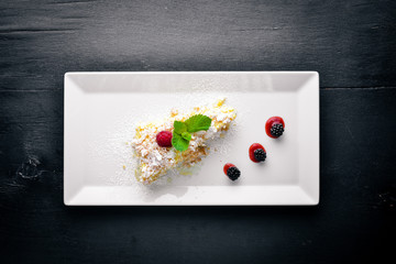 Puree Cream Cake. On a wooden background. Top view. Free space for your text.