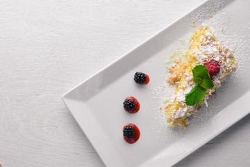 Puree Cream Cake. On a wooden background. Top view. Free space for your text.