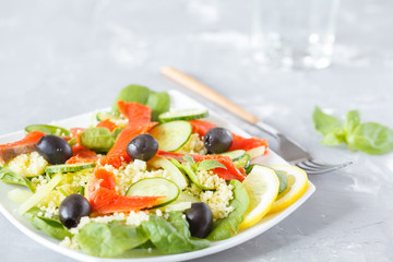Salad with couscous and salmon
