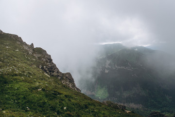 Foggy and cloudy mountains scenery in Tatry