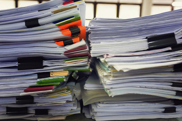 Pile of unfinished a bundle documents on office desk, Stack of business paper