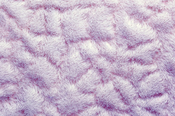 Macro texture of soft violet woolen fleece