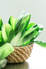 close up the Fresh baby green bok choy in basket
