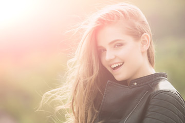 Girl in leather jacket.