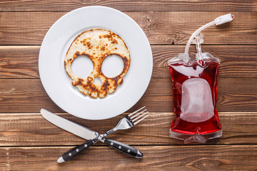 Pancake with packet of blood