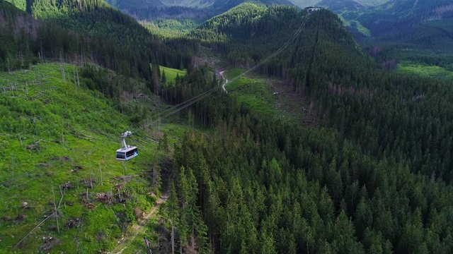 fligh over cableway in mountains