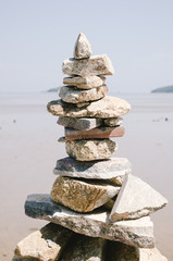 balance stones on beach background.