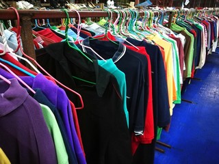 Obraz premium The Secondhand clothes in the market