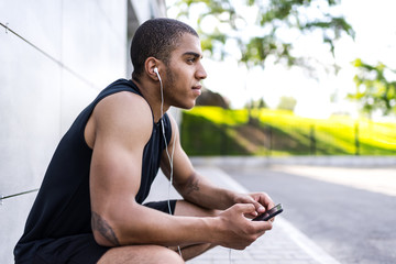 african american man with smartphone