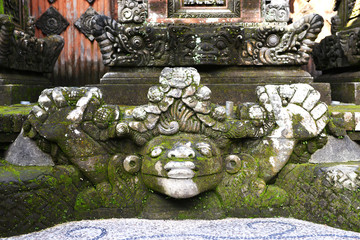 Closeup of traditional Balinese God statue in Bali temple