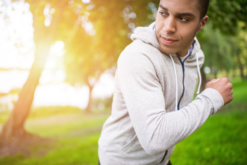 african american sportsman running in park