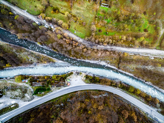 Waters of White and Black Agargi mountain rivers colliding,Georgia, aerial