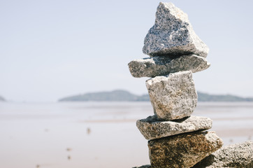 Copy space of balance stones on beach background.