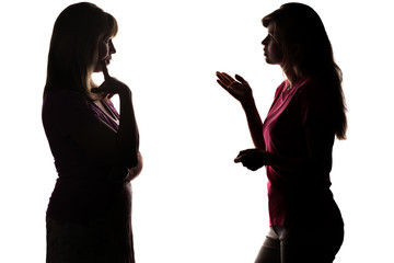 Silhouette mother and daughter dialogue