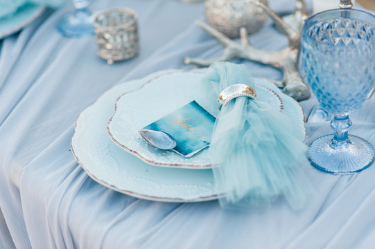 Beautiful Decorated Romantic Wedding Table on Sandy Beach