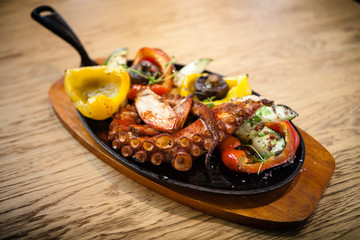 Boiled octopus with vegetables
