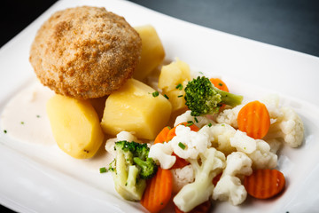 Chicken Kiev with vegetables