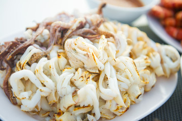 Grilled squid on a plate