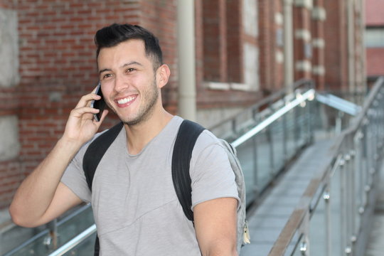 Cute mixed race person calling by phone
