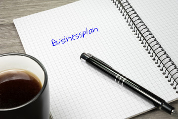 Ein Notizblock mit dem Wort Geschäftsplan