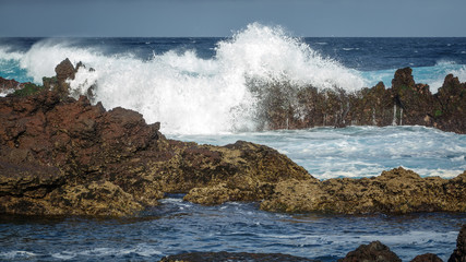 Biscoitos breaking waves in Terceira