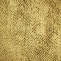 textured background painted in gold paper