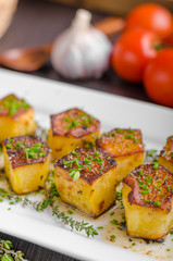 Potato fondant with garlic and herbs