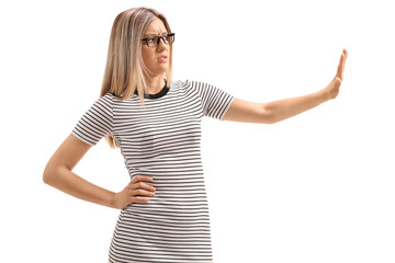 Young woman making a refuse gesture with her hand