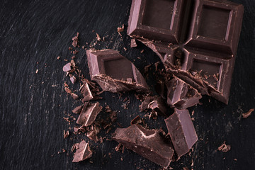 Dark chocolate stack, on wooden table,chocolate concept background