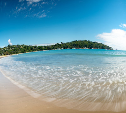 Panorama of sand beach and blue sea