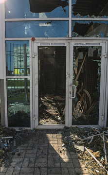 Burned construction with plastic door in summer