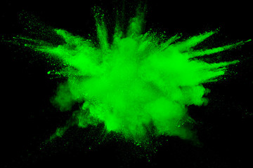 Bizarre forms of powder painted and flour combined explode in front of a black background to give...