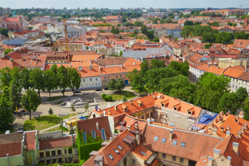 Fototapeta na wymiar A view from above of the old city of Vilnius with tilt shift lens effect