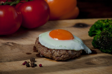 Steak with egg in the restaurant