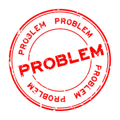 Grunge red problem round rubber seal stamp on white background