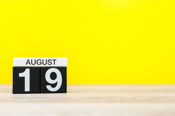 August 19th. Image of august 19, calendar on yellow background with empty space for text. Summer time