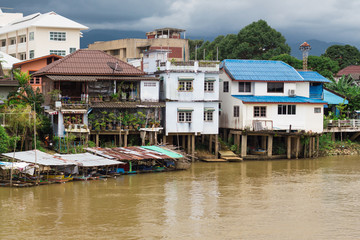 Fototapeta na wymiar Waterfront urban house on morning ,community of Chantaburi Thailand
