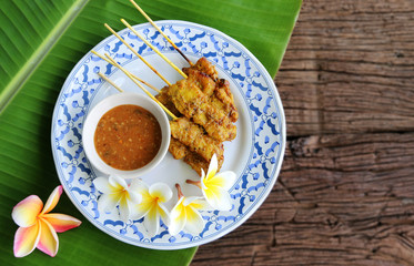 Pork satay with Peanut Sauce Original Thai food.top view with space for your text