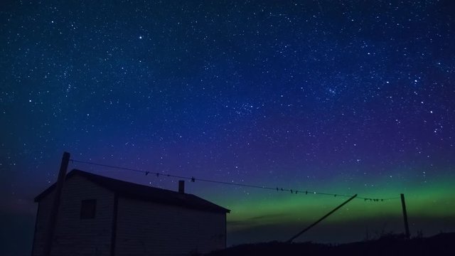 Northern Lights, Aurora Borealis over Broom point fishing village