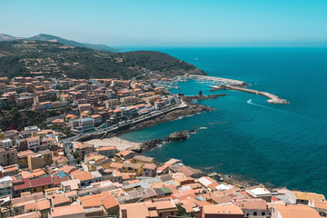 High angle view of old italian town in bay. Sardinia. Italy.