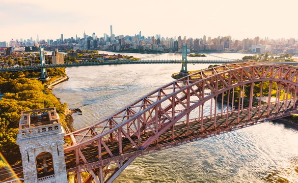 Aerial view of the Hell Gate Bridge over the East River in New York City
